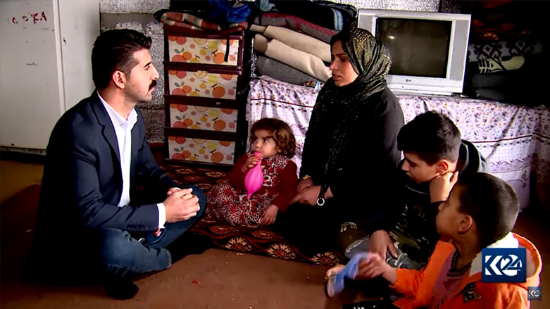 Kurdistan 24 correspondent Azar Faruq, interviewing survivors of ISIS crimes at Hassan Sham camp, Jan. 11, 2022. (Photo: Azar Faruq/Kurdistan 24)